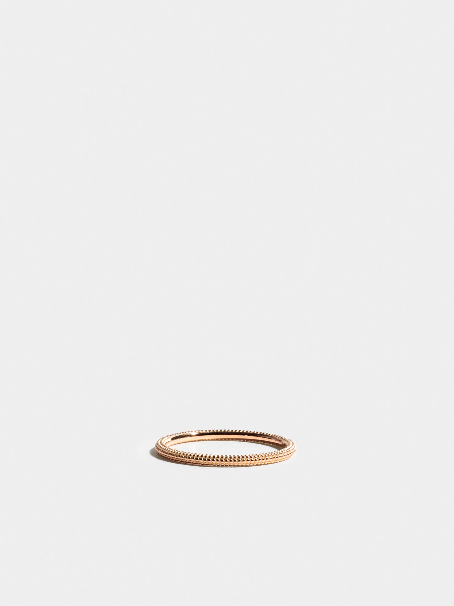 Fair trade Ring: Anagramme “millegrains” Ring aus Roségold, liegend