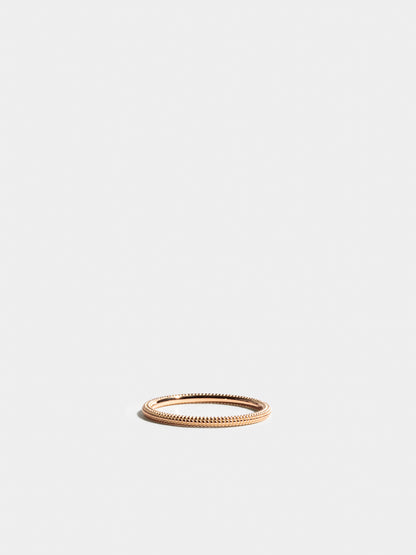 Fair trade Ring: Anagramme “millegrains” Ring aus Roségold, liegend